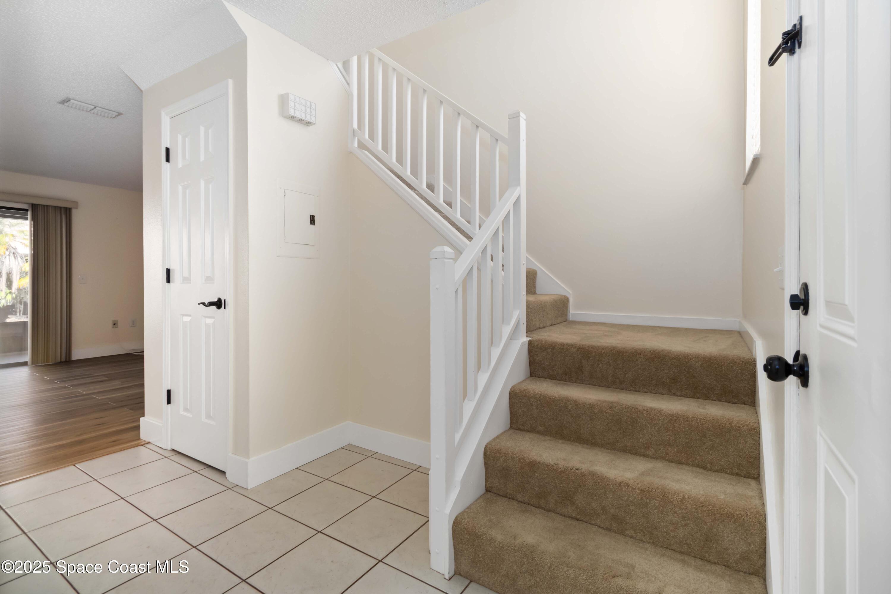 182 Bluefish Place, Unit 710 Rockledge, FL 32955 - Photo 16 of 33 a view of an entryway with staircase