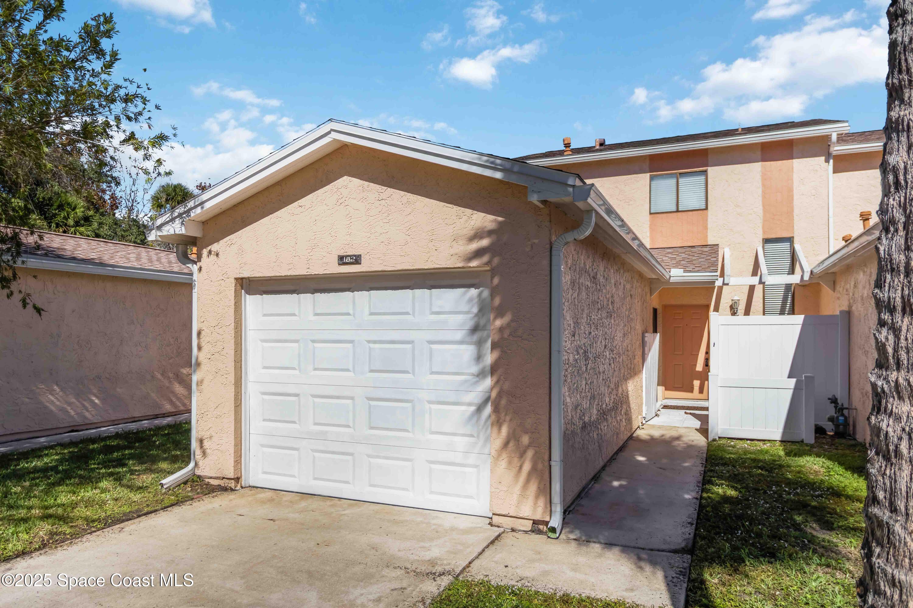 182 Bluefish Place, Unit 710 Rockledge, FL 32955 - Photo 2 of 33 a view of front door