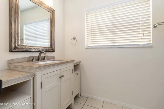 a bathroom with a sink and a vanity