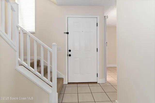 a view of an entryway with staircase