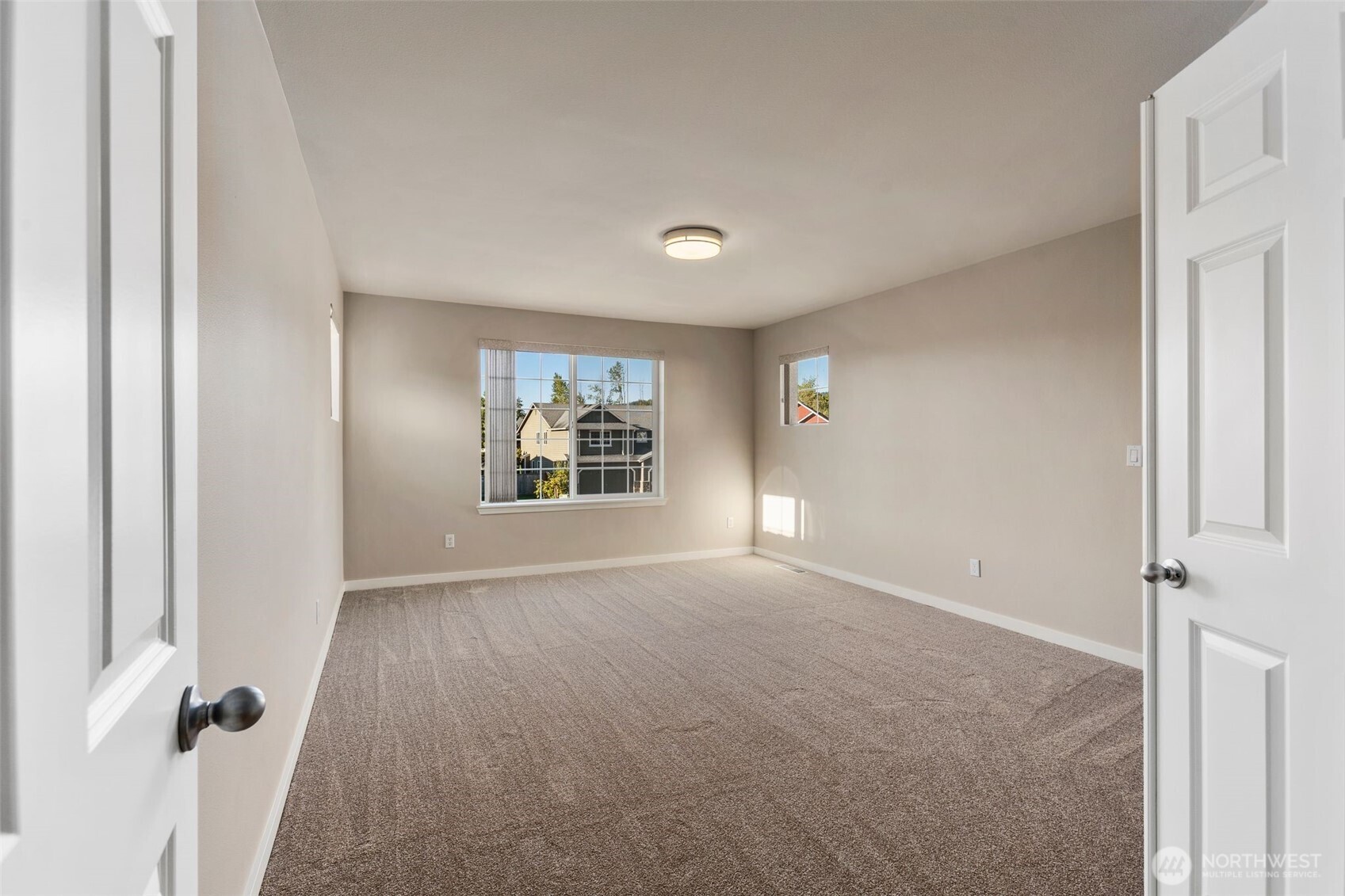 6203 Northeast 4th Circle Renton, WA 98059 - Photo 27 of 40 an empty room with windows