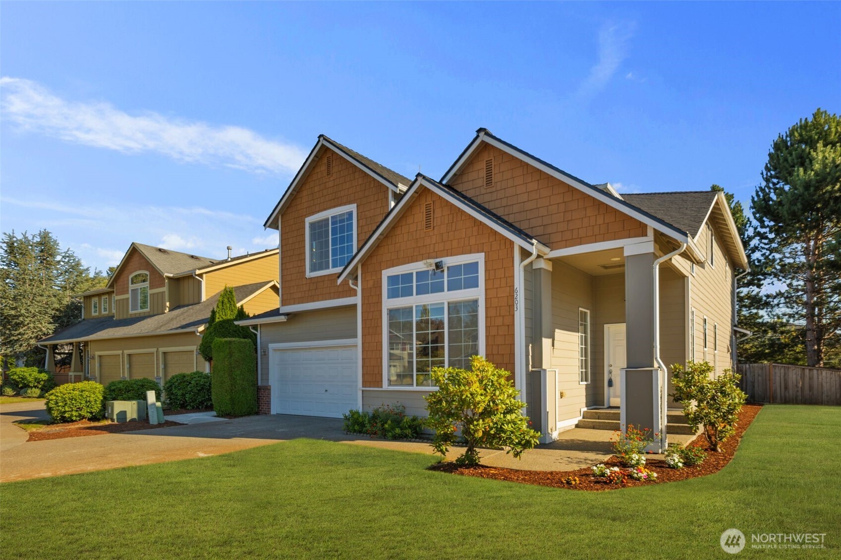 6203 Northeast 4th Circle Renton, WA 98059 - Photo 3 of 40 front view of a house with a yard