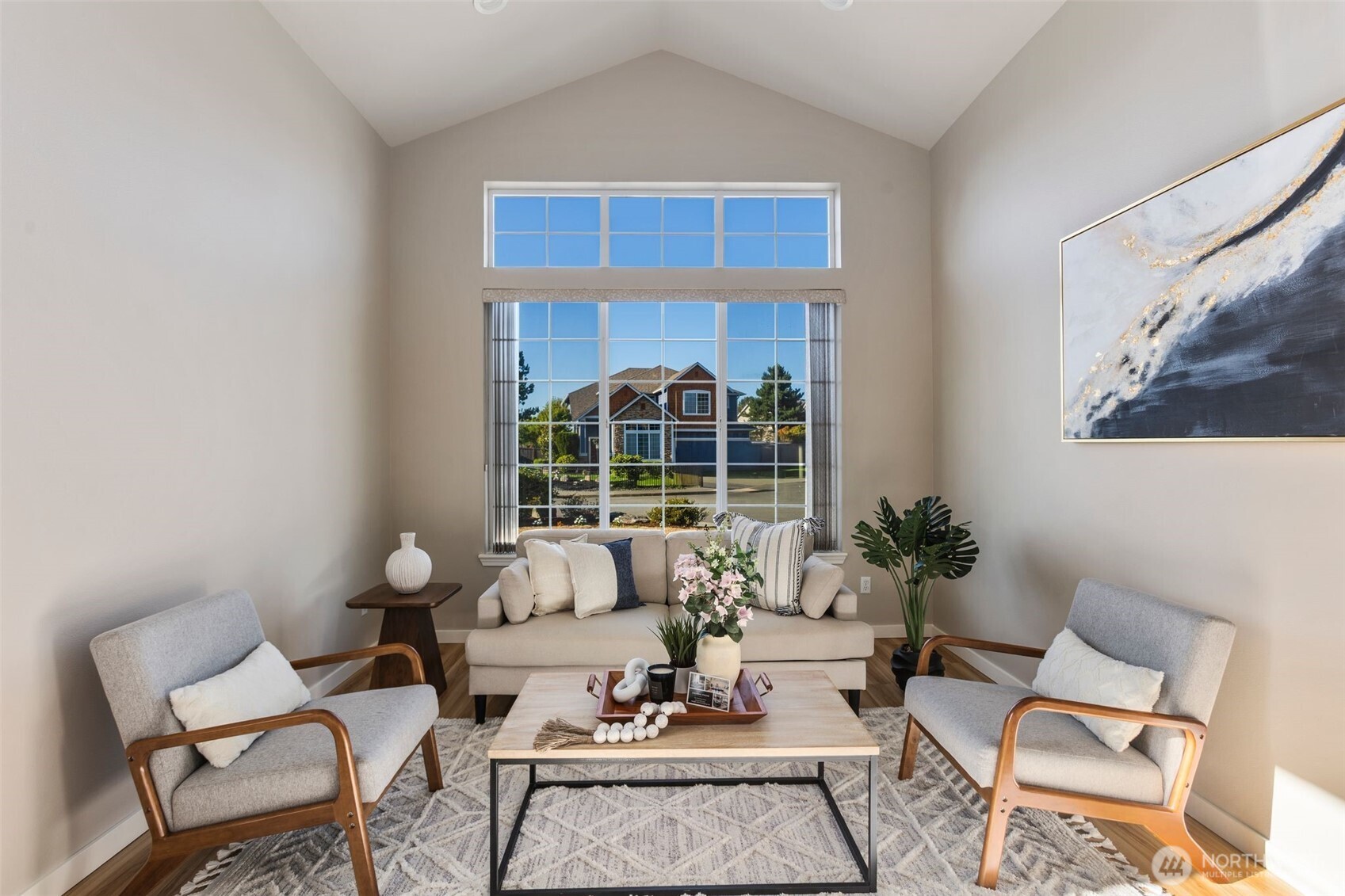 6203 Northeast 4th Circle Renton, WA 98059 - Photo 7 of 40 a living room with furniture and a potted plant