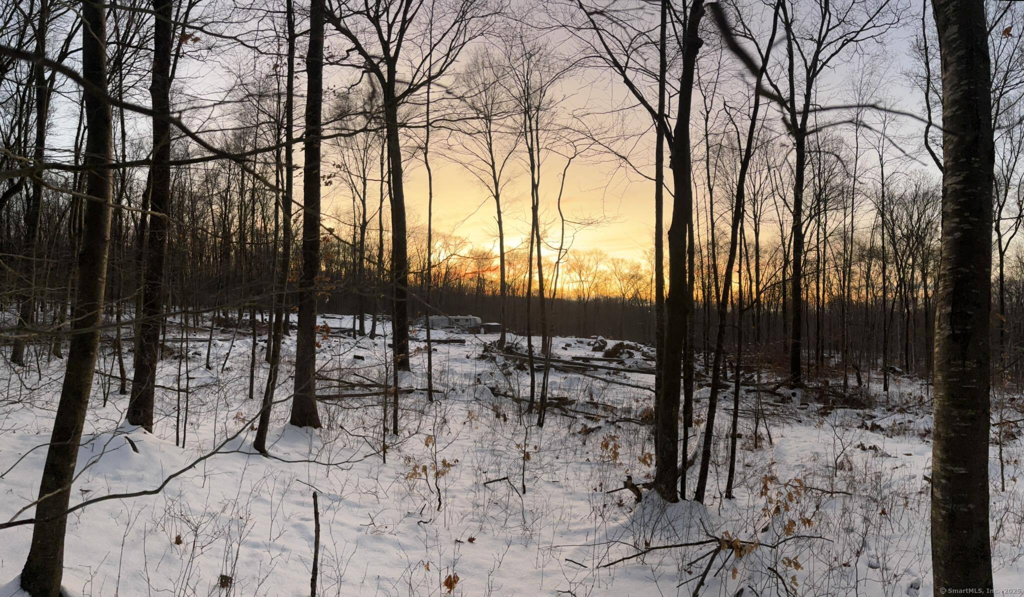 64 Whippoorwill Road Old Lyme, CT 06371 - Photo 2 of 8 a view of outdoor space with seating