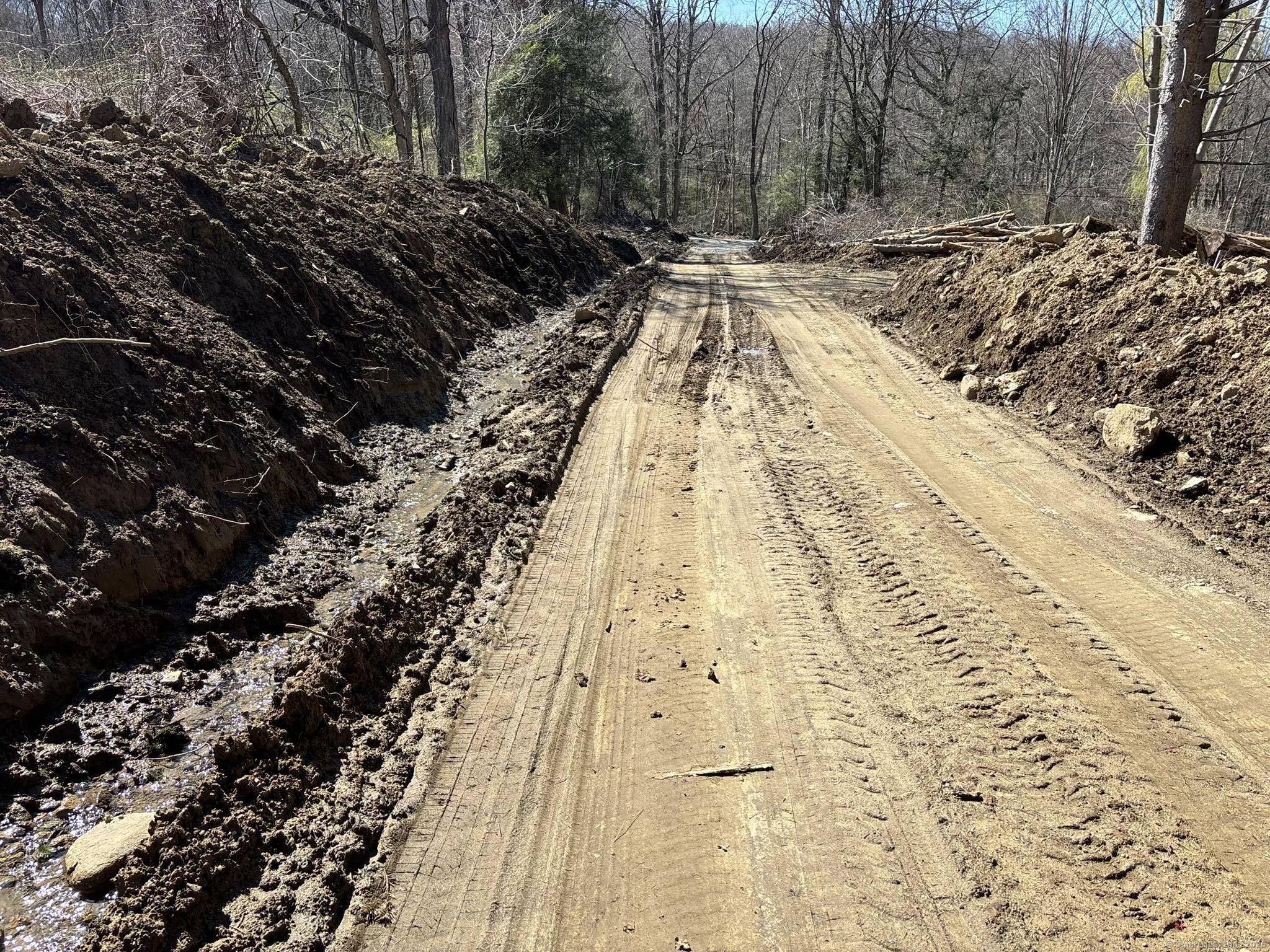 64 Whippoorwill Road Old Lyme, CT 06371 - Photo 8 of 8 a view of swimming pool with sitting area