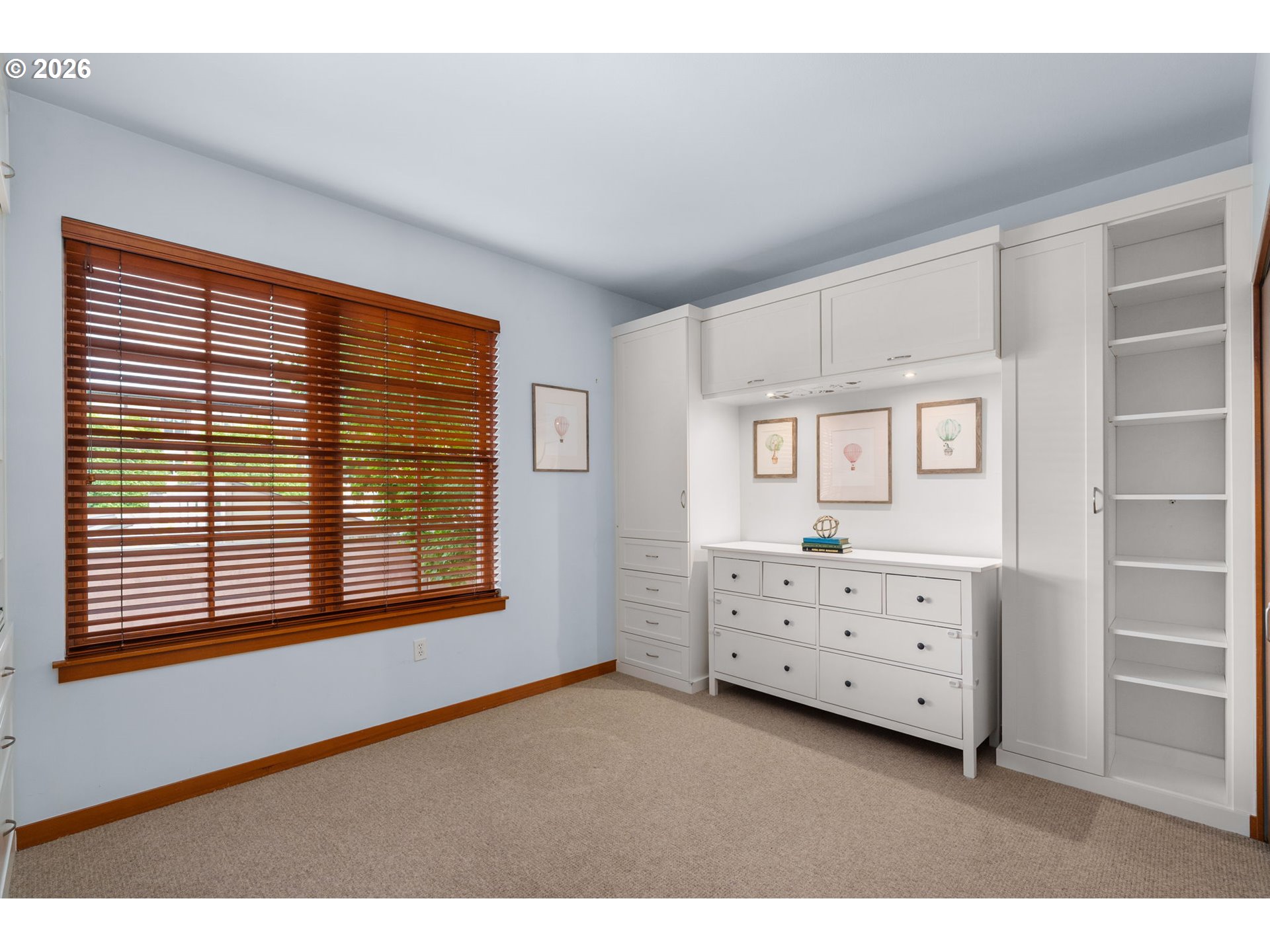 2350 Northwest Savier Street, Unit 224 Portland, OR 97210 - Photo 14 of 19 a room with a dresser and a window