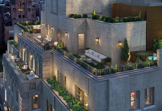 an aerial view of balcony and yard