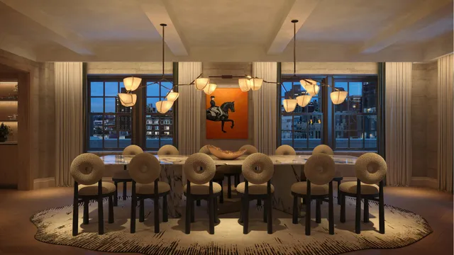 a view of a dining room with furniture and chandelier