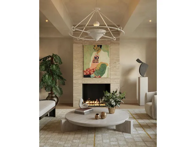 a living room with furniture a chandelier and a fireplace