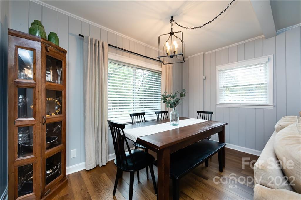 6409 Montpelier Road Charlotte, NC 28210 - Photo 20 of 35 a view of a dining room with furniture window and wooden floor