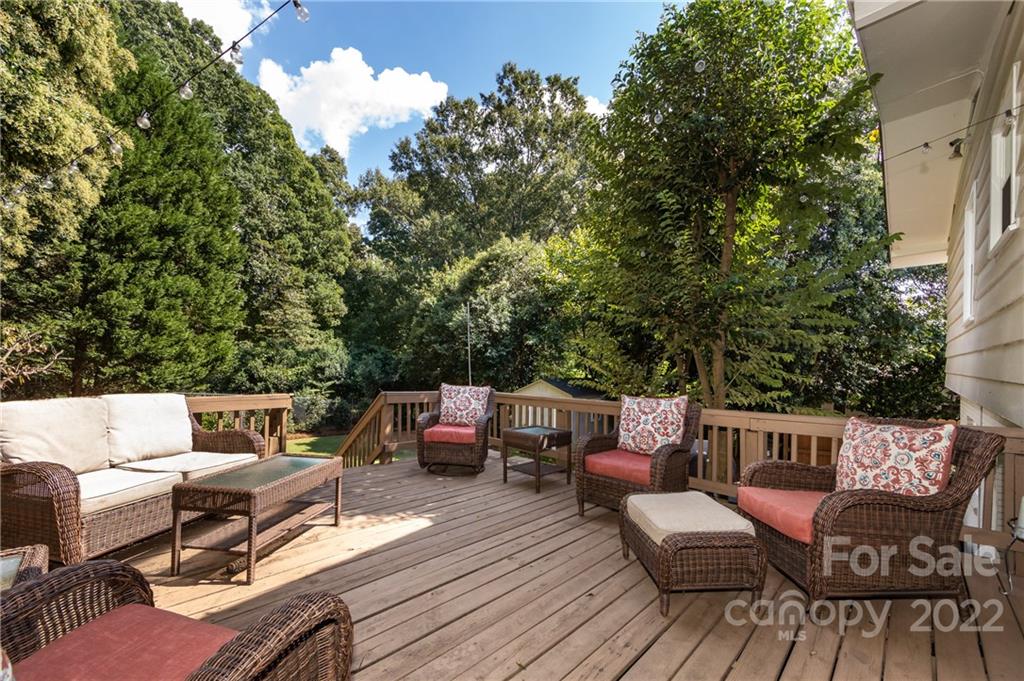 6409 Montpelier Road Charlotte, NC 28210 - Photo 31 of 35 a view of a dinning table and chairs in the roof deck