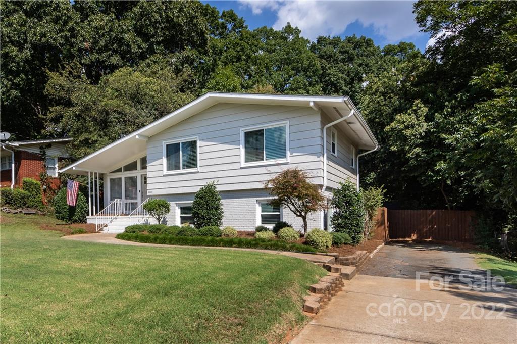 6409 Montpelier Road Charlotte, NC 28210 - Photo 34 of 35 a front view of a house with a yard