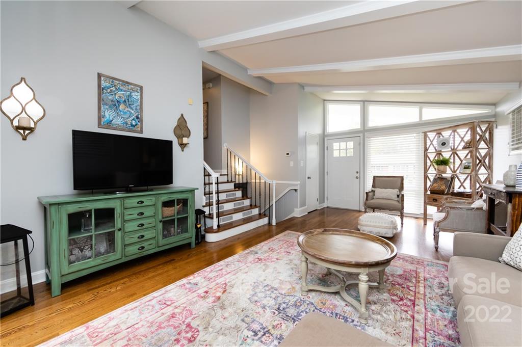 6409 Montpelier Road Charlotte, NC 28210 - Photo 6 of 35 a living room with furniture and a flat screen tv