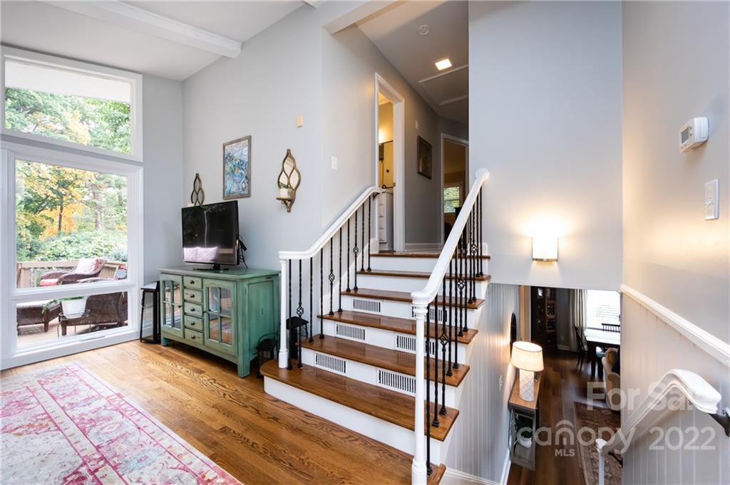 6409 Montpelier Road Charlotte, NC 28210 - Photo 8 of 35 a view of entryway and hall with wooden floor