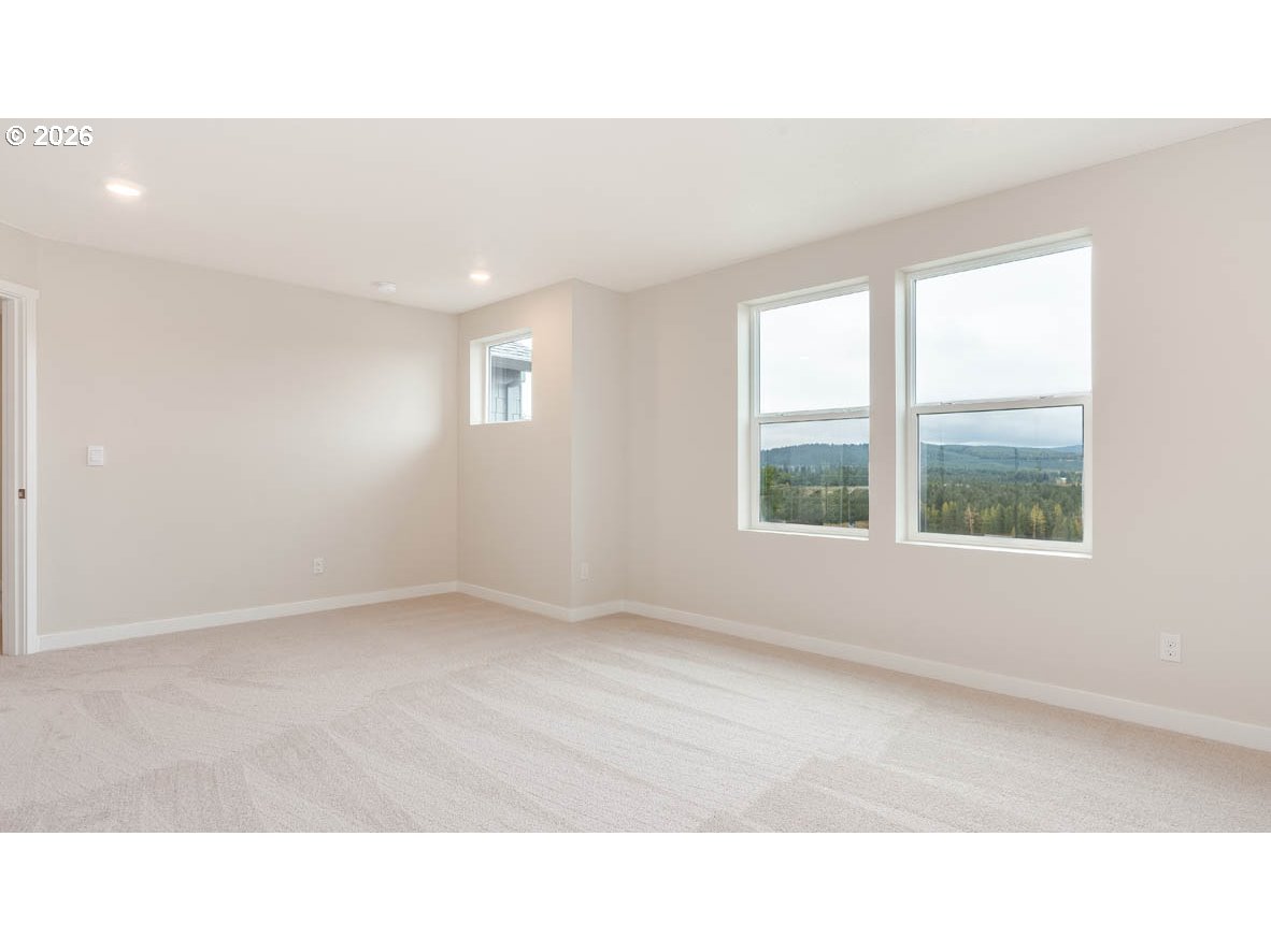 9194 Southeast Azalea Street Happy Valley, OR 97086 - Photo 20 of 32 a open hall with a window