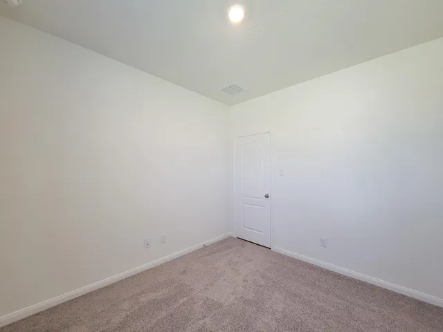 a bathroom with a double vanity sink and mirror