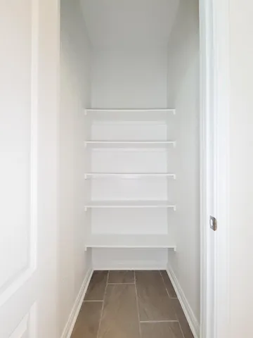 a bathroom with a tub sink double and mirror