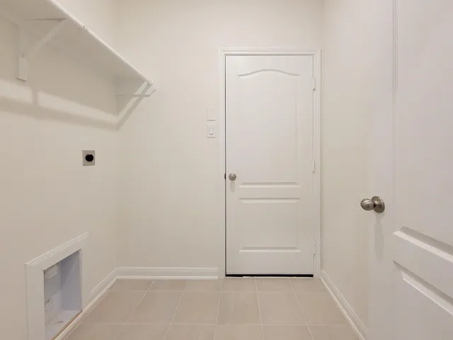 a view of a backyard with a garden and entertaining space