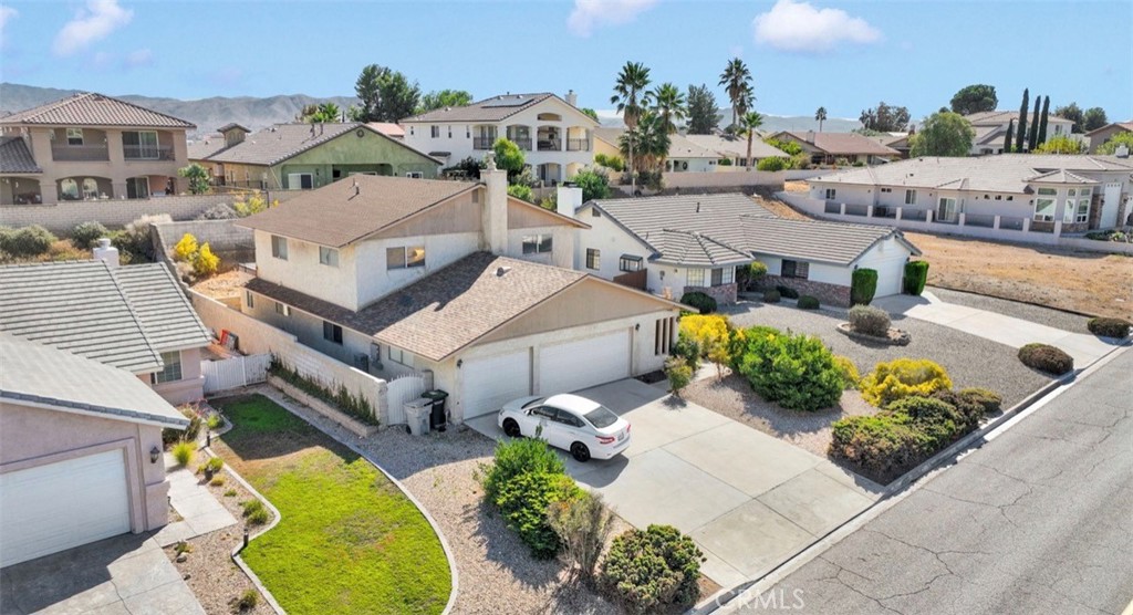18199 Kalin Ranch Drive Victorville, CA 92395 - Photo 26 of 31 an aerial view of a house with a swimming pool