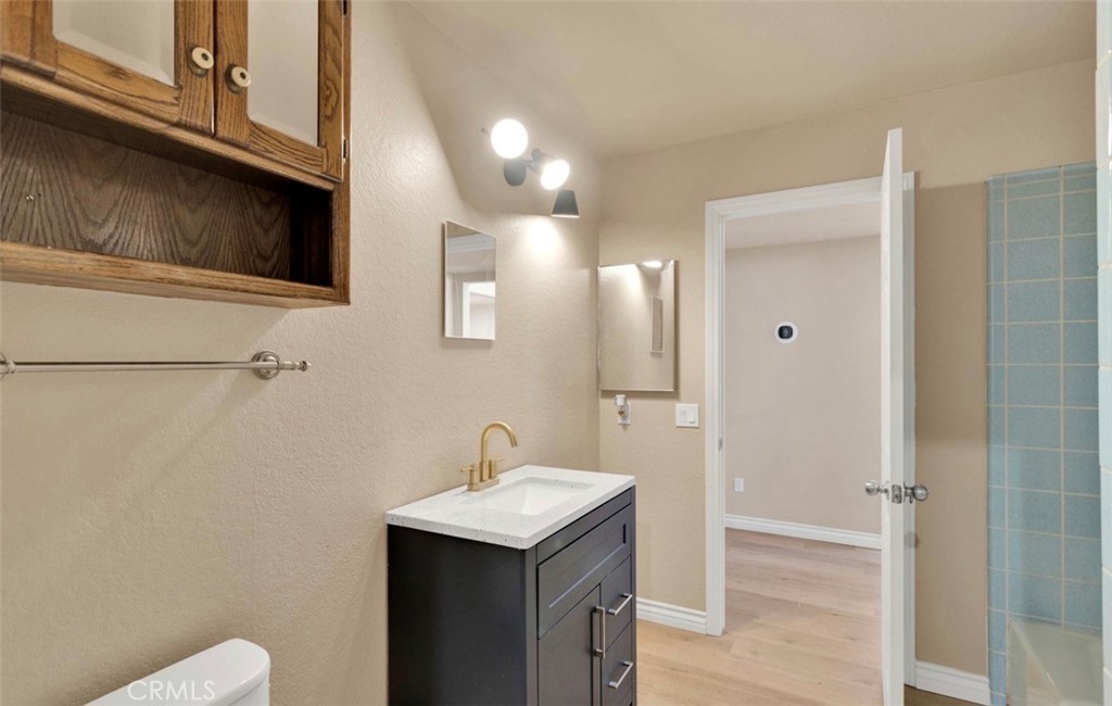 18199 Kalin Ranch Drive Victorville, CA 92395 - Photo 9 of 31 a bathroom with a sink and mirror