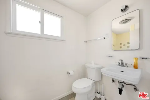 a view of a window in the bathroom