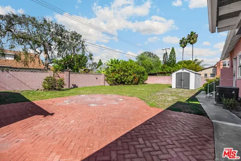 a house with garden in front of it