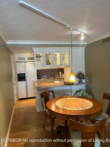 a room with table and chairs