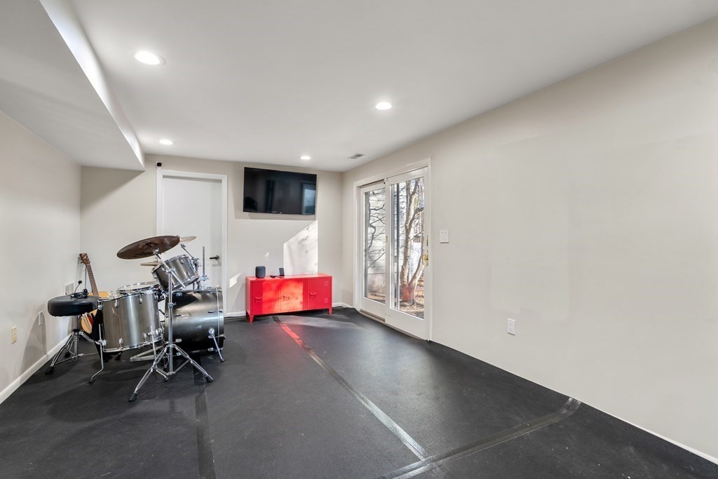 27 Grace Road Newton, MA 02459 - Photo 20 of 26 a view of livingroom with furniture and wooden floor