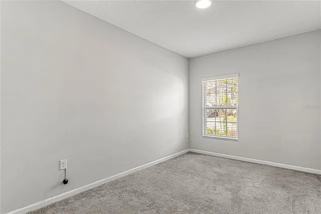 an empty room with a window