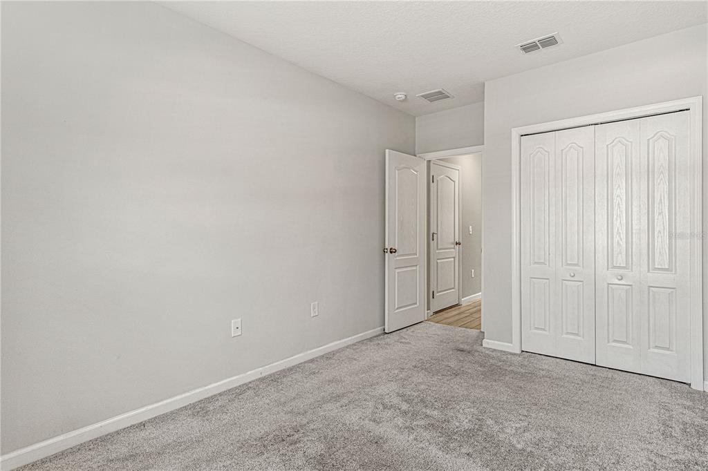 2875 Narcoossee Cmns Way St. Cloud, FL 34771 - Photo 13 of 50 a view of an empty room