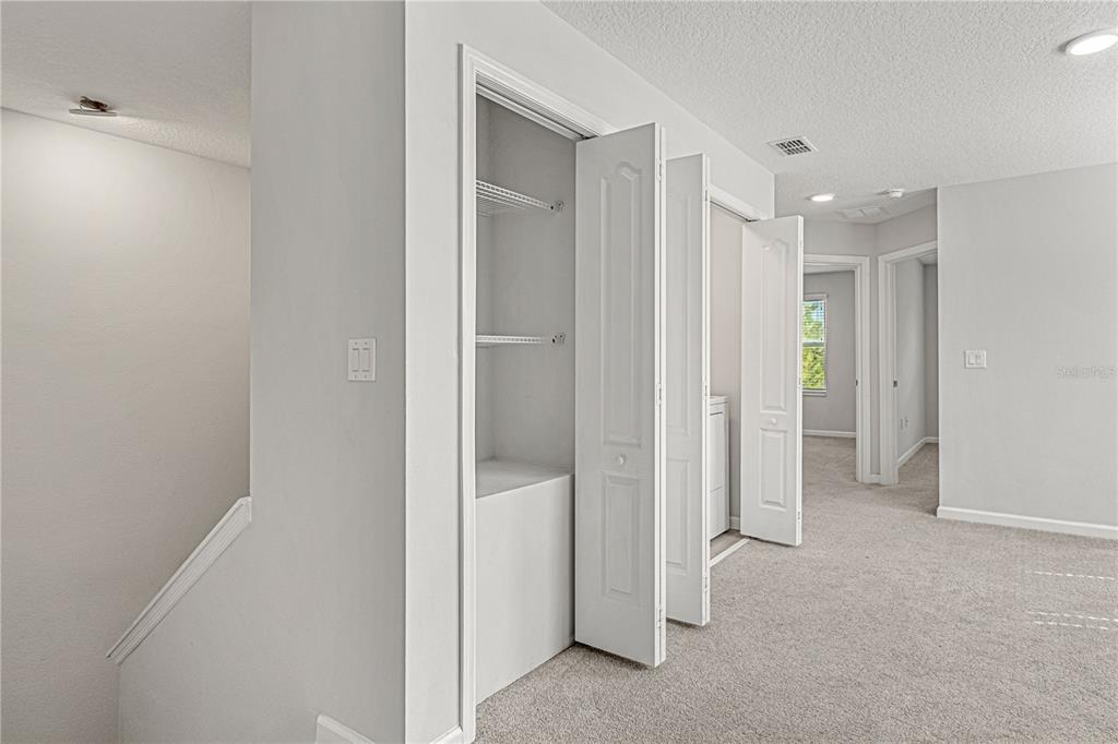 2875 Narcoossee Cmns Way St. Cloud, FL 34771 - Photo 17 of 50 a view of a hallway with an empty room