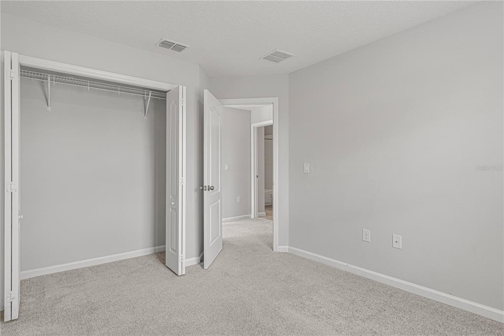 2875 Narcoossee Cmns Way St. Cloud, FL 34771 - Photo 25 of 50 a view of an empty room