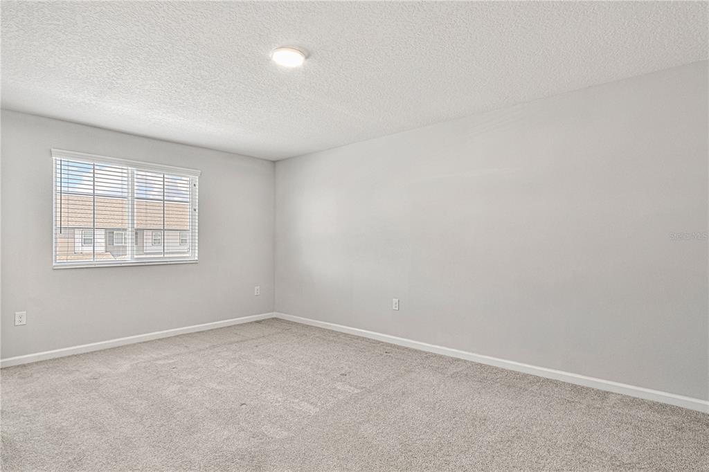 2875 Narcoossee Cmns Way St. Cloud, FL 34771 - Photo 28 of 50 an empty room with a window