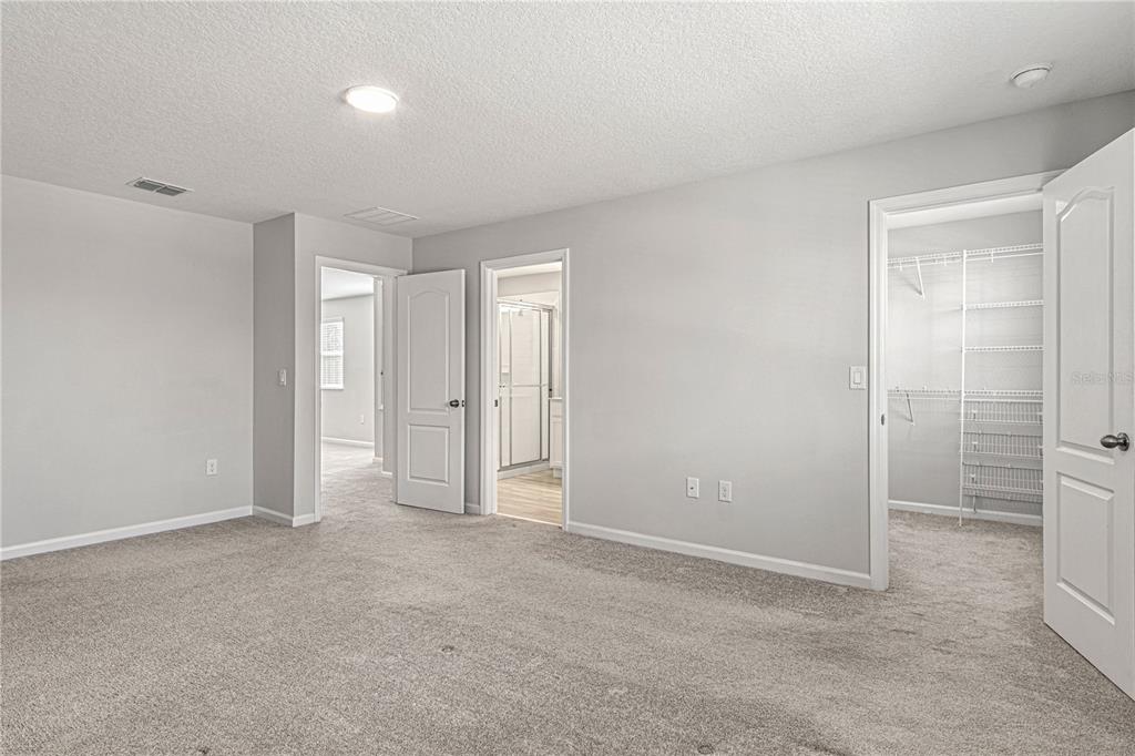 2875 Narcoossee Cmns Way St. Cloud, FL 34771 - Photo 29 of 50 a view of an empty room