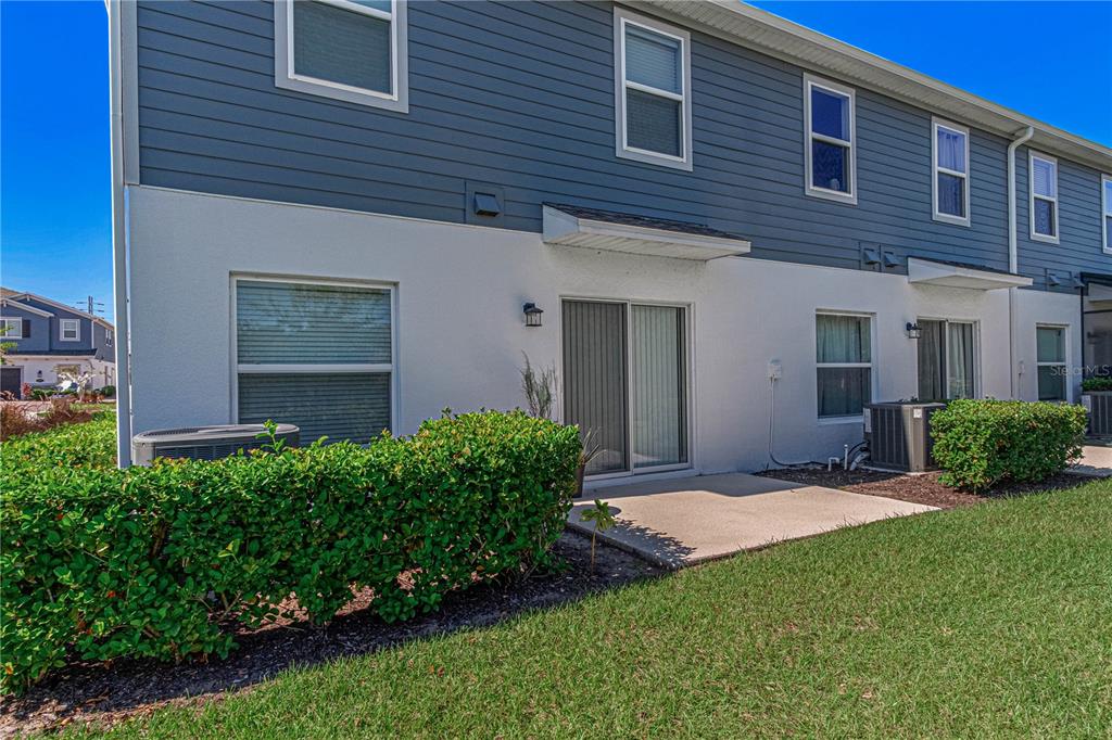 2875 Narcoossee Cmns Way St. Cloud, FL 34771 - Photo 34 of 50 a view of outdoor space yard and front view of a house