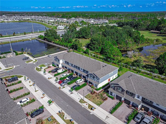 an aerial view of a house with a garden