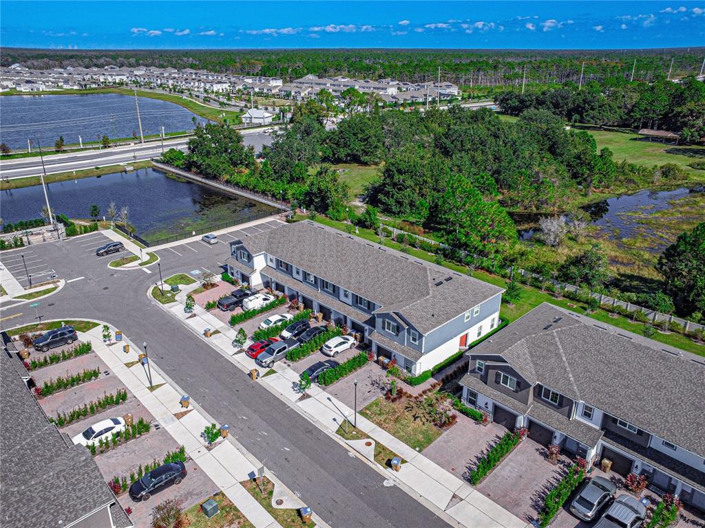 2875 Narcoossee Cmns Way St. Cloud, FL 34771 - Photo 38 of 50 an aerial view of a house with a garden
