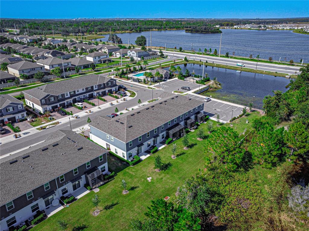 2875 Narcoossee Cmns Way St. Cloud, FL 34771 - Photo 39 of 50 an aerial view of a house with a garden