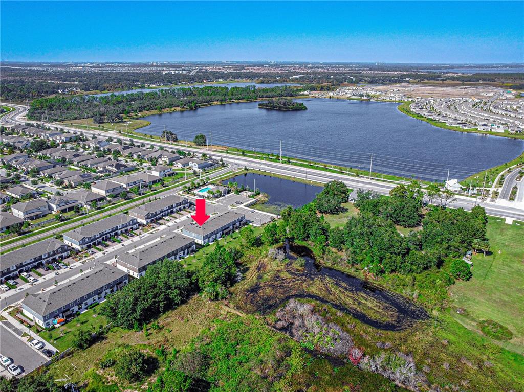 2875 Narcoossee Cmns Way St. Cloud, FL 34771 - Photo 40 of 50 an aerial view of a city