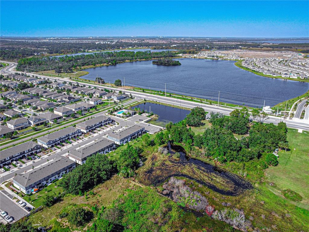 2875 Narcoossee Cmns Way St. Cloud, FL 34771 - Photo 41 of 50 an aerial view of a city