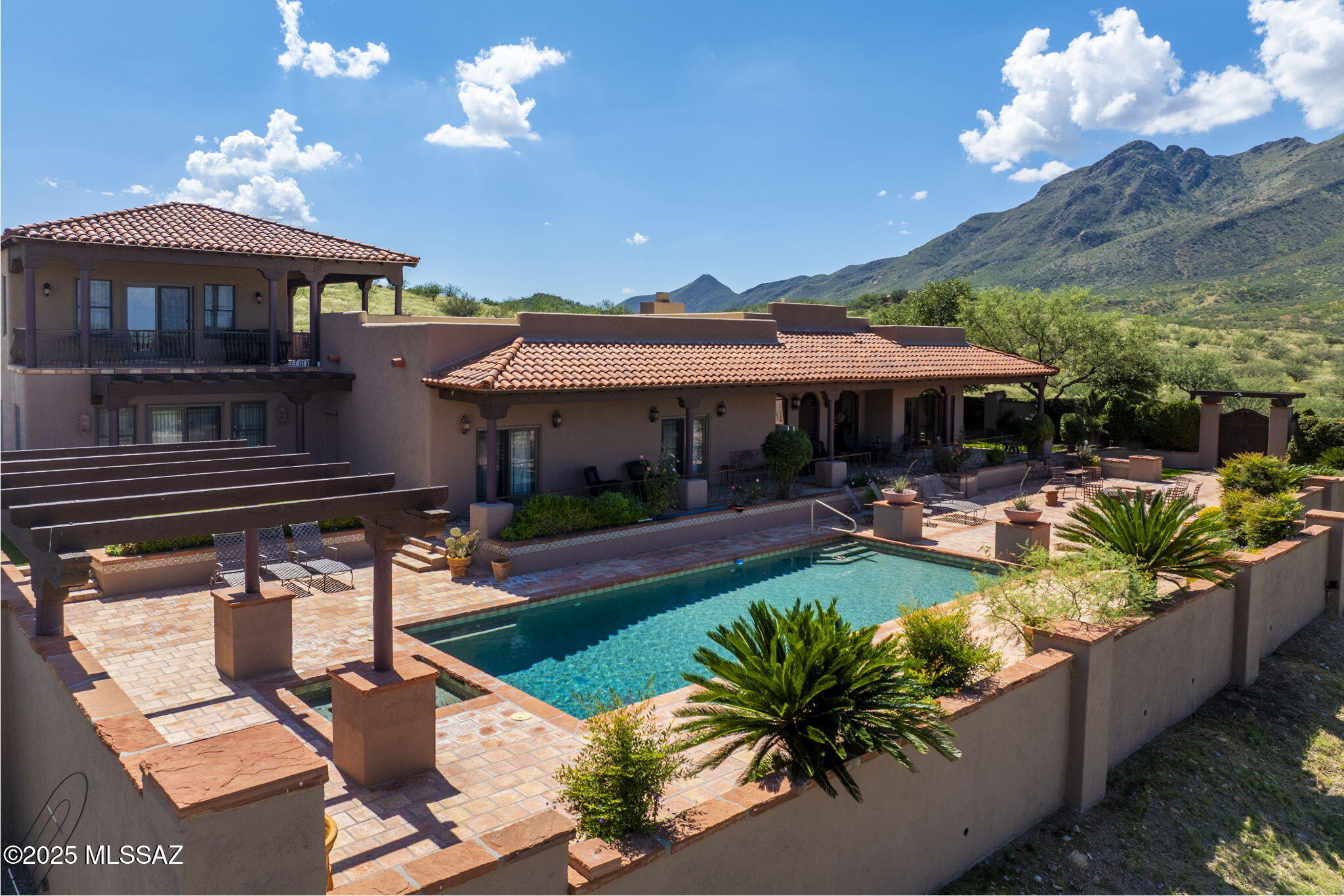 1265 Morning Star Drive Rio Rico, AZ 85648 - Photo 6 of 50 a view of a house with swimming pool and sitting area