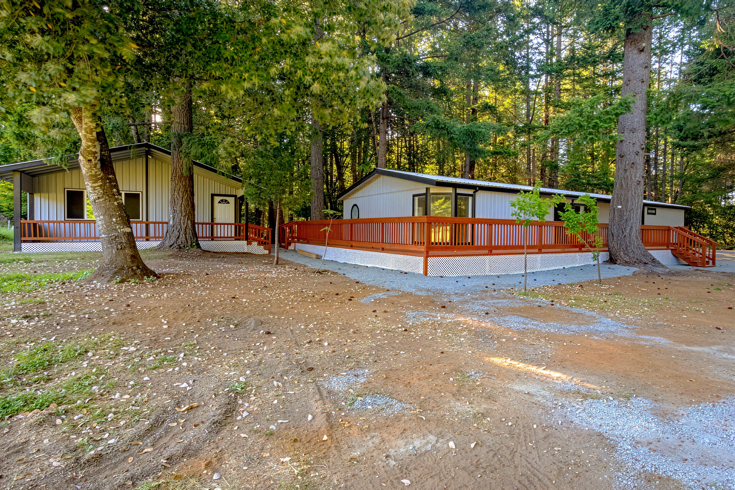 601 Pinewood Way Cave Junction, OR 97523 - Photo 26 of 33 a view of a house with a backyard