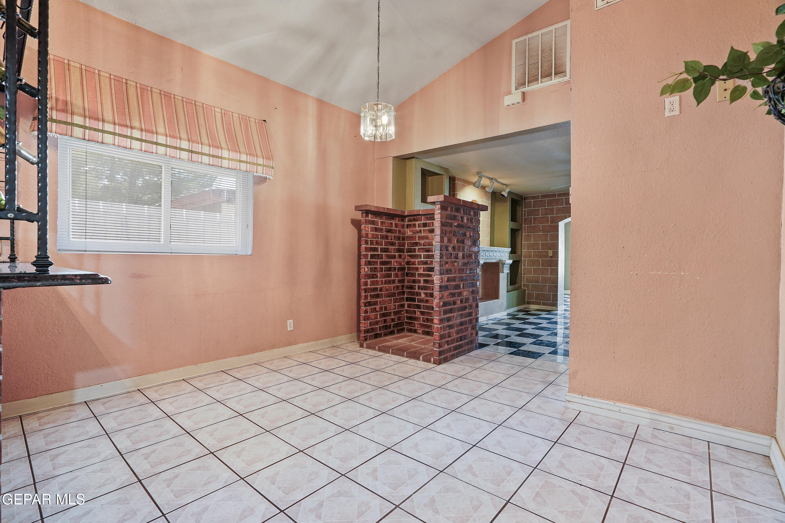 306 A Street Southwest Fabens, TX 79838 - Photo 12 of 37 a view of an empty room with staircase