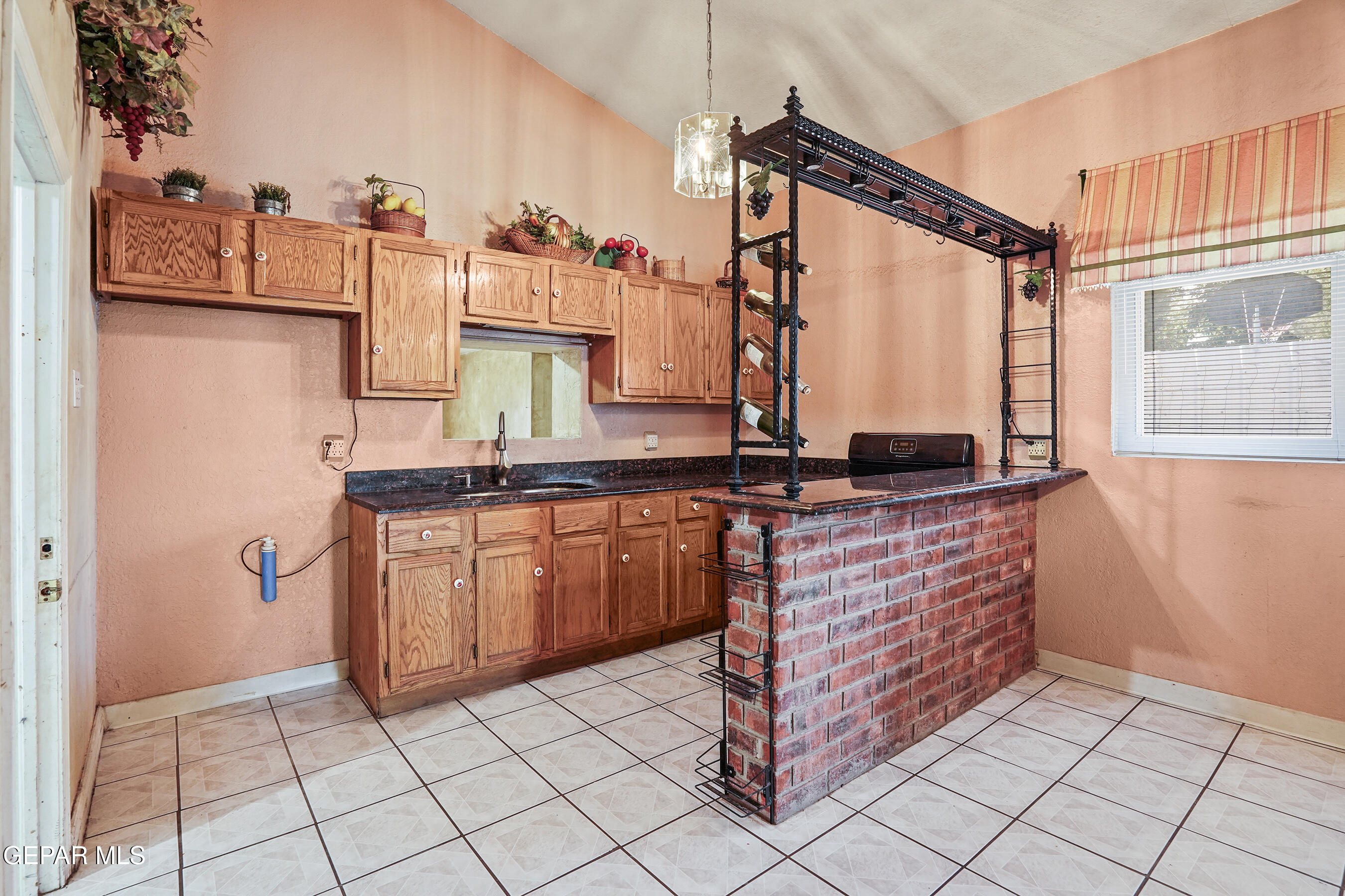 306 A Street Southwest Fabens, TX 79838 - Photo 13 of 37 a kitchen with stainless steel appliances granite countertop a sink and a cabinets