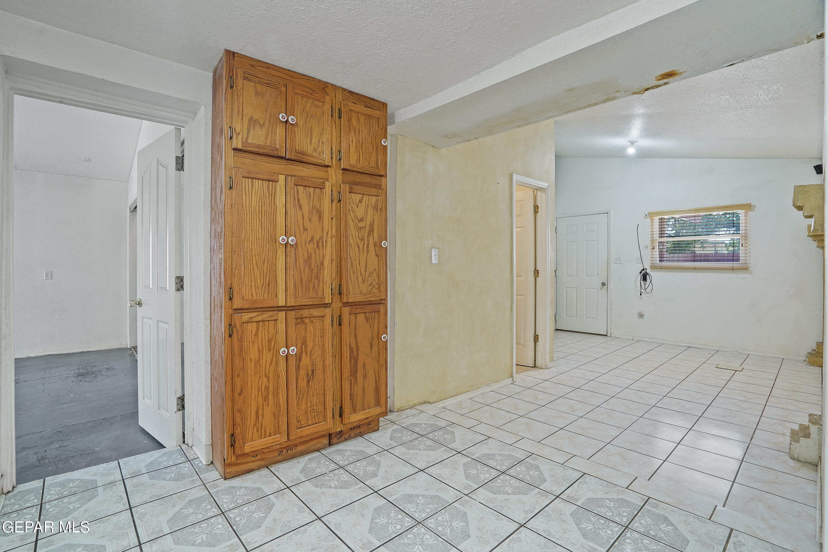 306 A Street Southwest Fabens, TX 79838 - Photo 16 of 37 an empty room with windows and closet