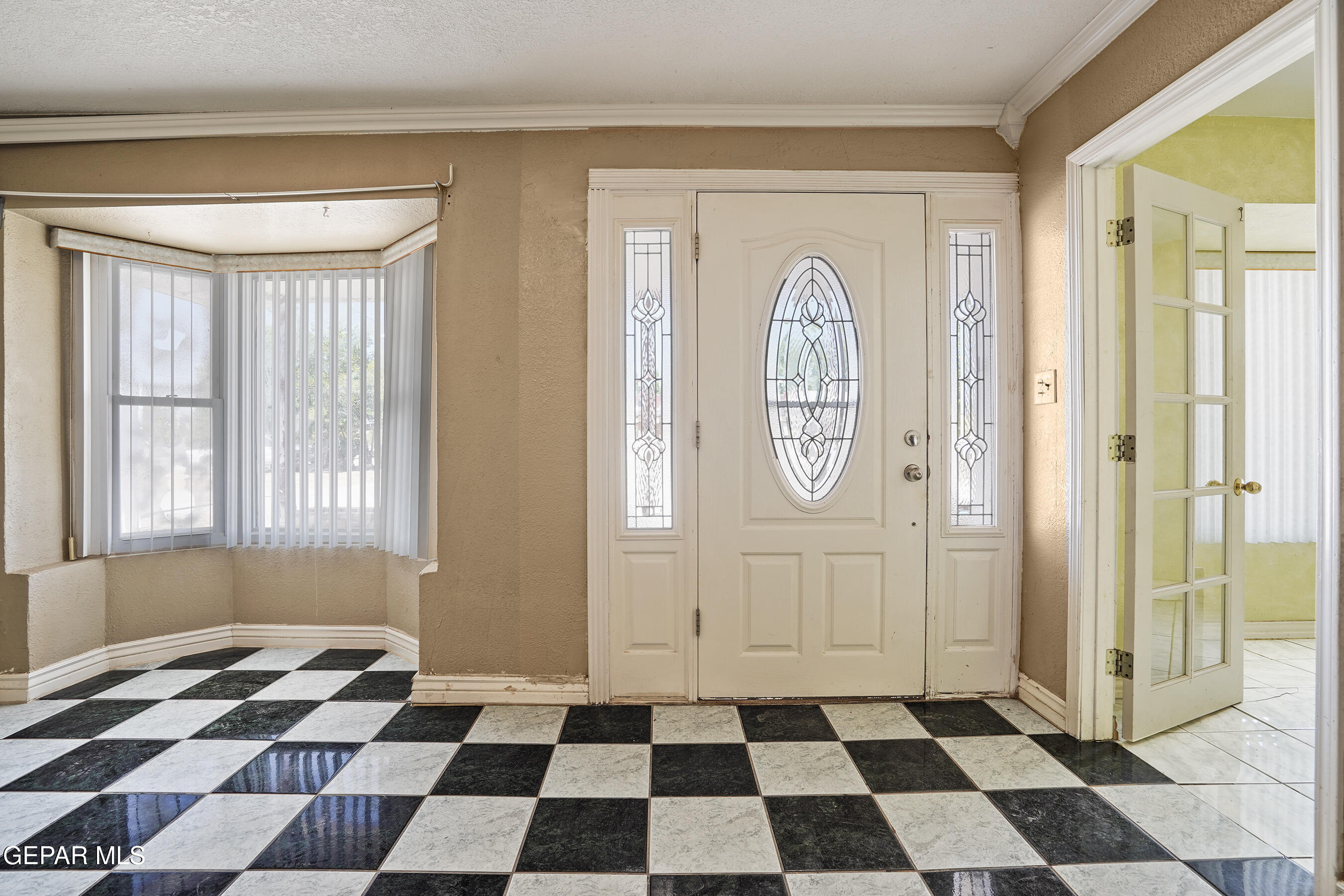 306 A Street Southwest Fabens, TX 79838 - Photo 2 of 37 a black and white checkered floor with a black white checkered floor