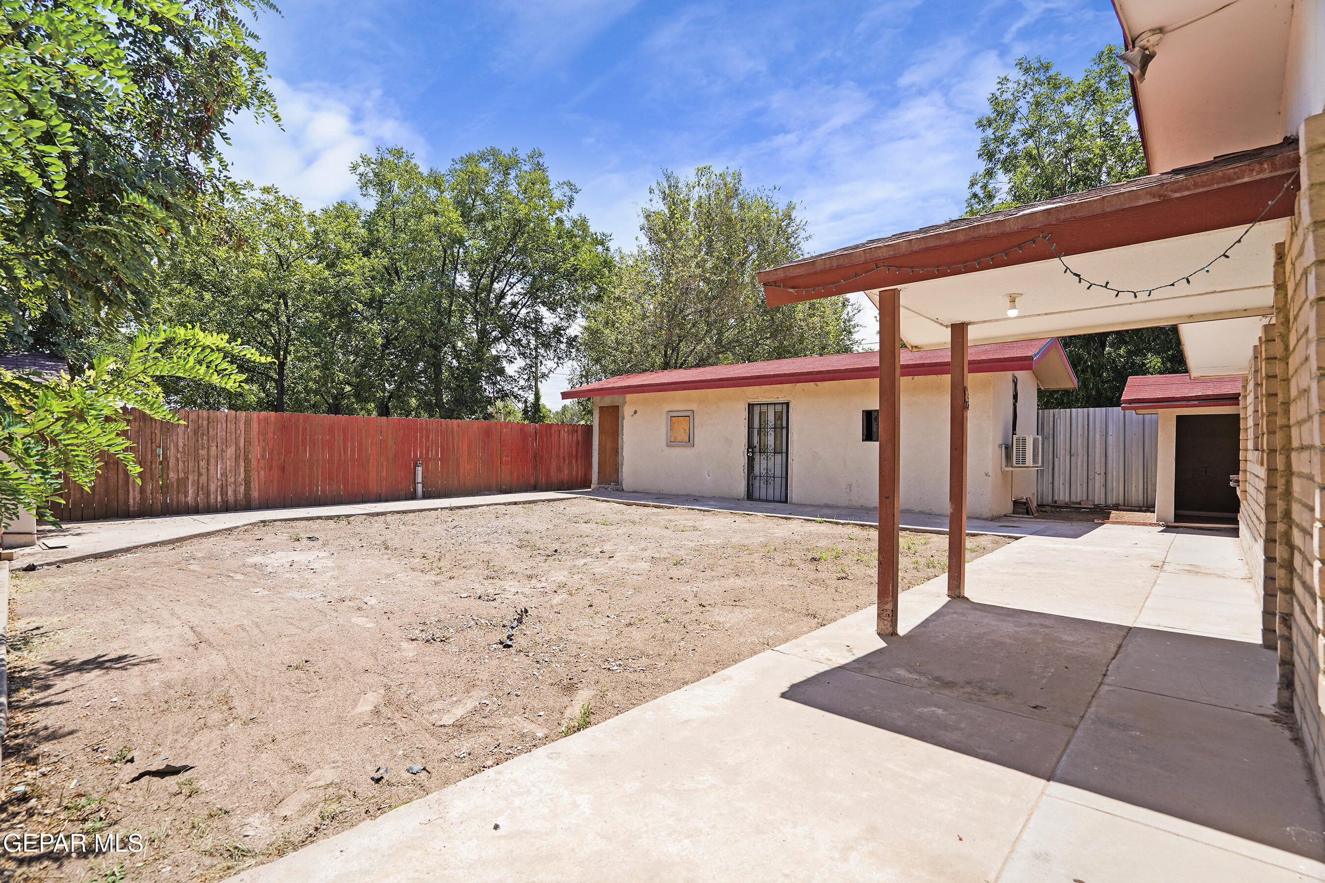 306 A Street Southwest Fabens, TX 79838 - Photo 29 of 37 a view of a house with a yard and garage
