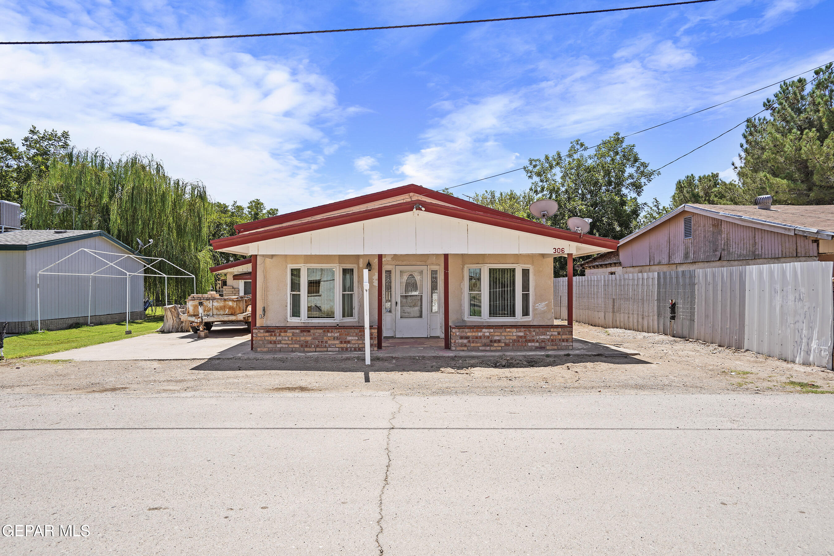 306 A Street Southwest Fabens, TX 79838 - Photo 35 of 37 a front view of house with yard