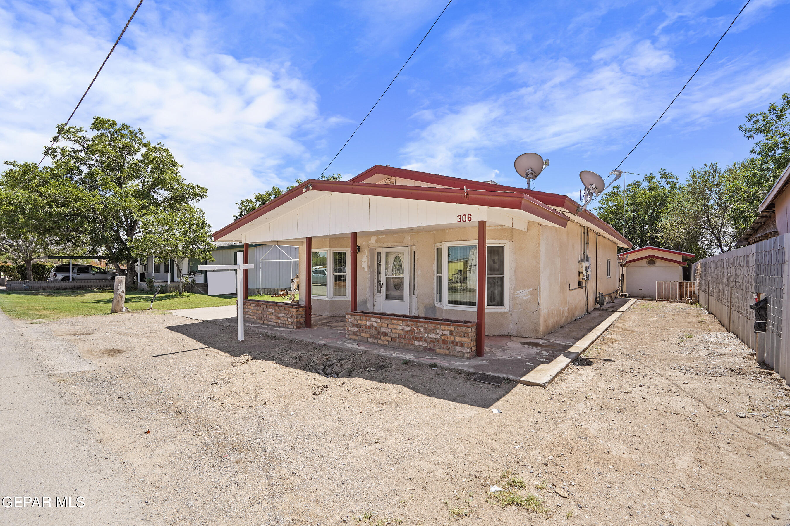 306 A Street Southwest Fabens, TX 79838 - Photo 36 of 37 a view of a house with backyard and trees