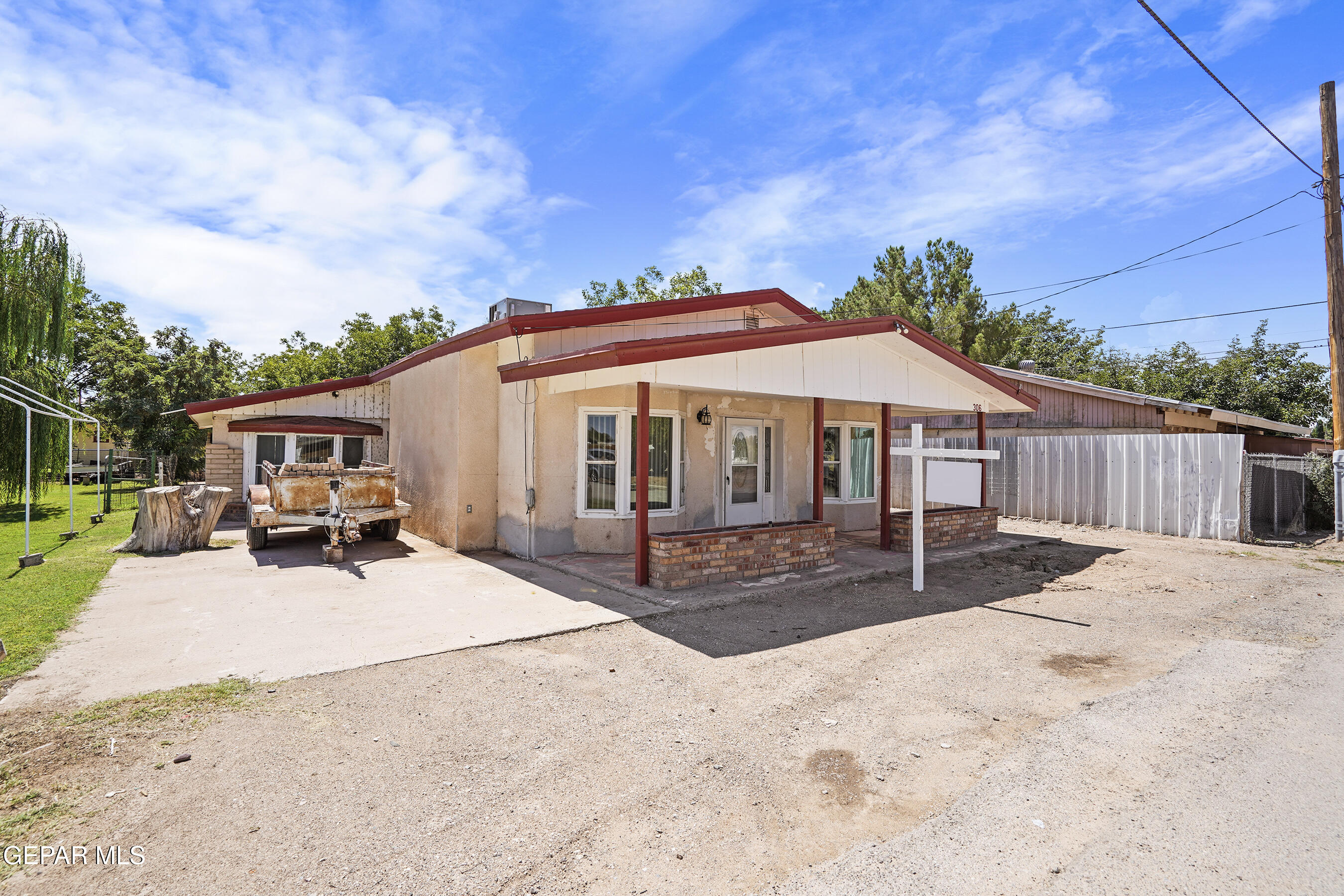 306 A Street Southwest Fabens, TX 79838 - Photo 37 of 37 a view of a house with backyard and sitting area
